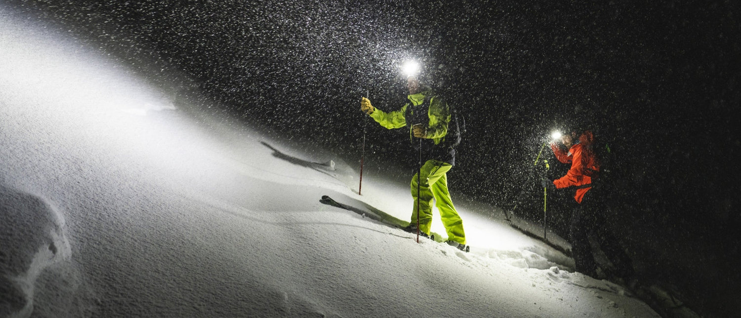 BD employee Adam Peters and BD ambassador Nik Berry illuminated by headlamps
