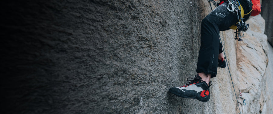 A climber slab climbs in the Aspect Pro Shoe