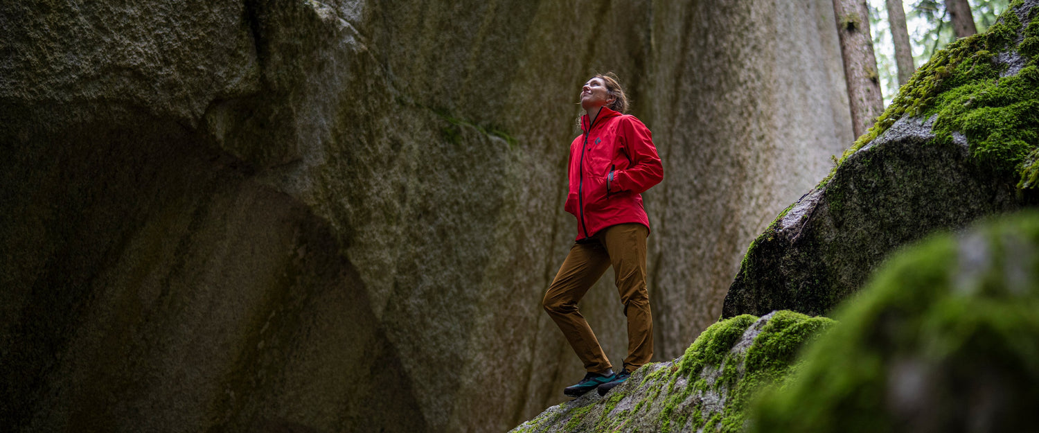 Black Diamond athlete Colette McInerney looks up a cliff face in Squamish, BC