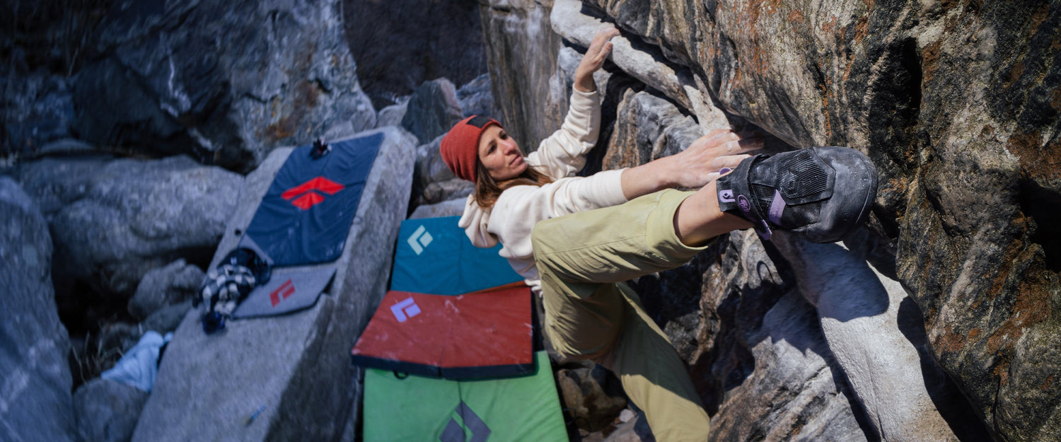 A climber bouldering in Ticino, Switzerland