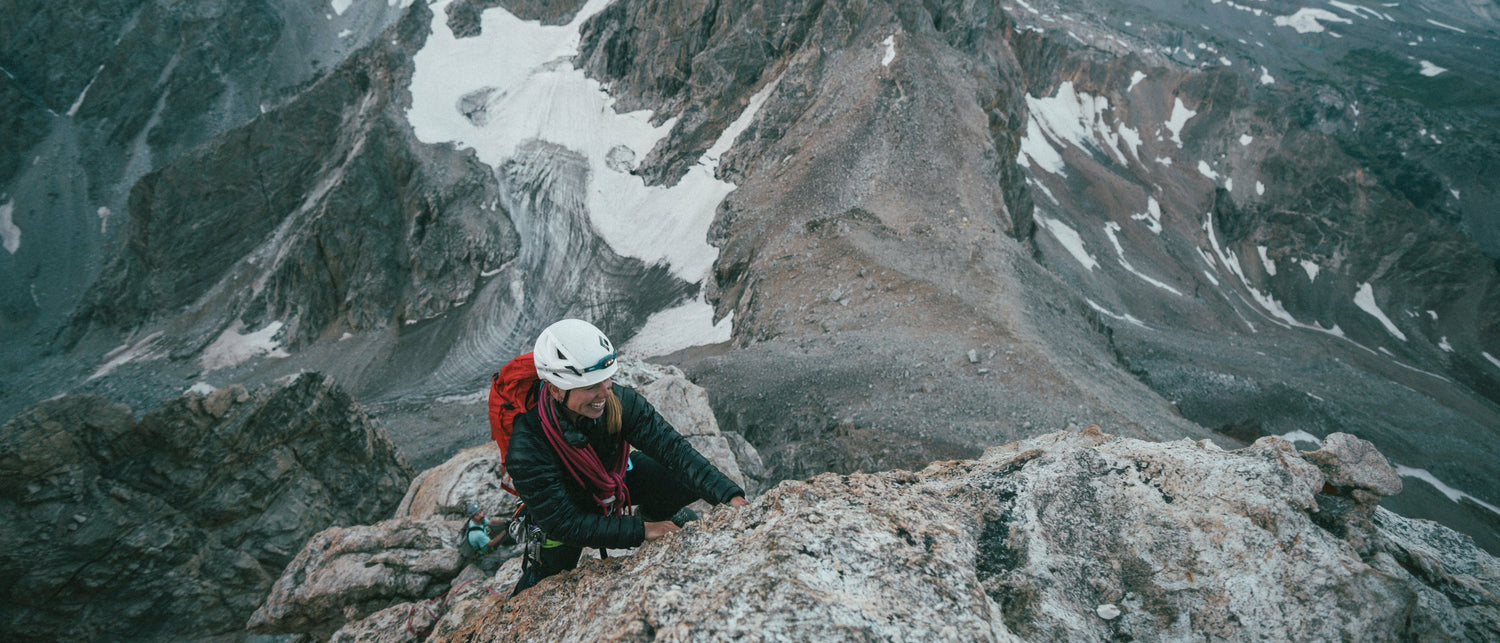 A climber in a Black Diamond helmet near the summit of the Grand Teton. 