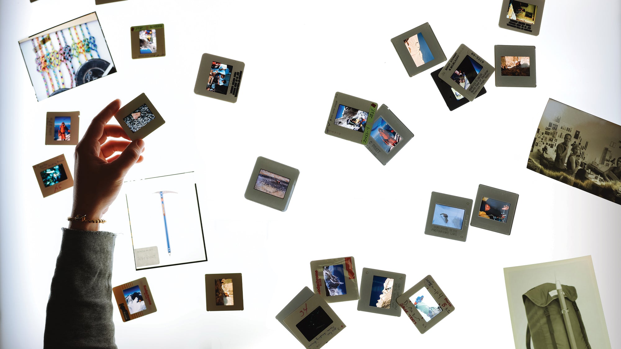 Black Diamond archive photographs surrounding a climber holding a slide